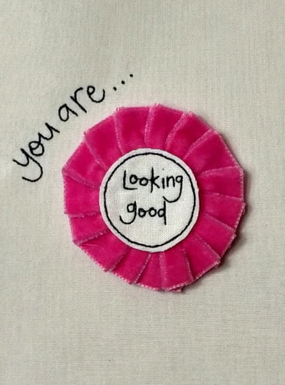 you-are-looking-good-rosette-badge.jpg